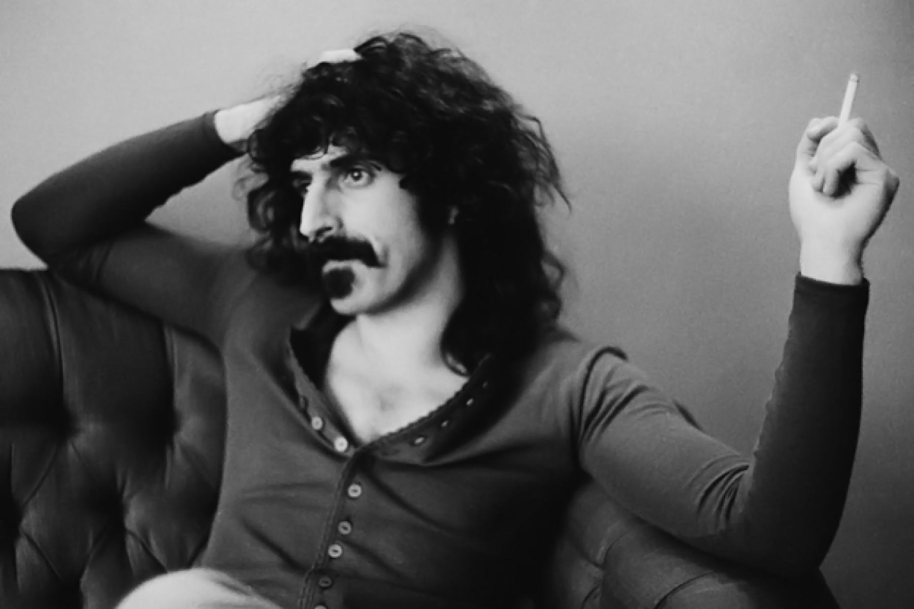 Frank Zappa smoking a cigarette